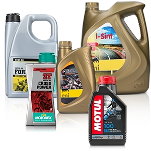 Several bottles of motor oil from different brands such as Motul, Eni and Motorex next to each other.
